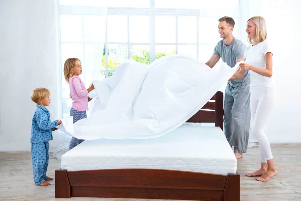 family cleaning the bed in a bedroom that make you sick