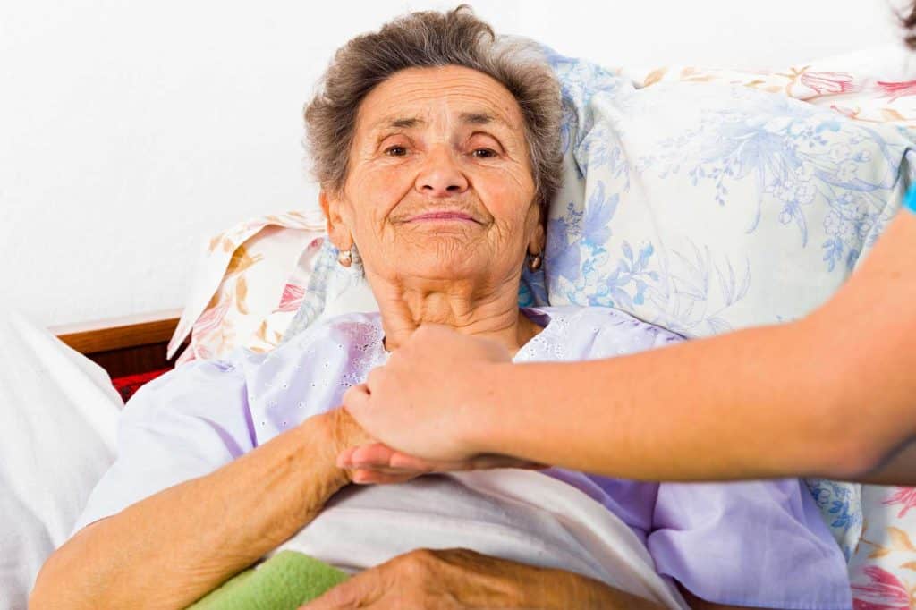 elderly suffering parkinson's disease