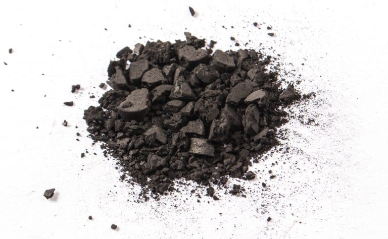 Activated carbon powder isolated on white